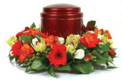 Couronne urne fleurs deuil orange vif